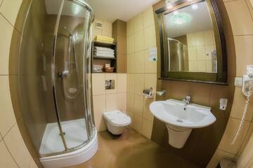 Фото номера Двухместный номер 4**** с 2 отдельными кроватями Курортные отели Apollo Wellness Club г. Сынджорджу-де-Муреш 3